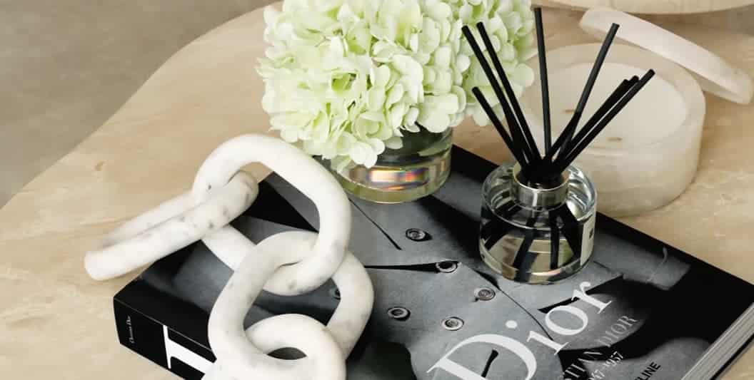 Elegant modern interior decor with white accents and stylish accessories.