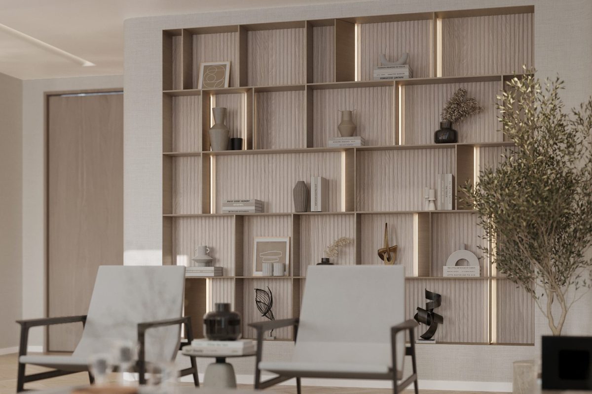Living room of the Four Seasons apartment with a full-height display wall in fluted timber and lit niches