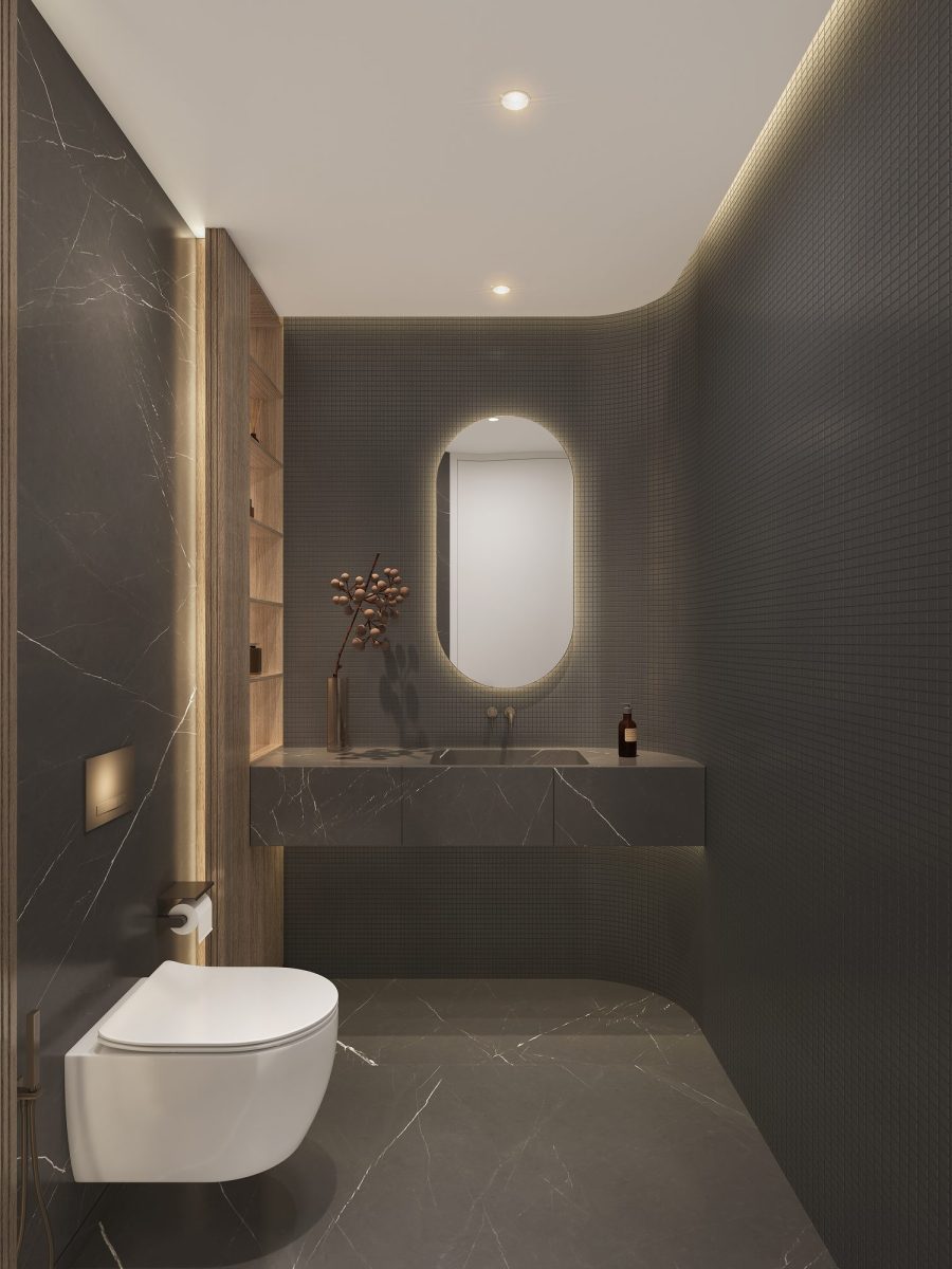 Powder room of a Woodland Terraces apartment with a sculptural stone basin